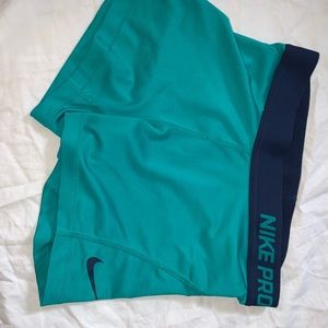 Turquoise Nike pros